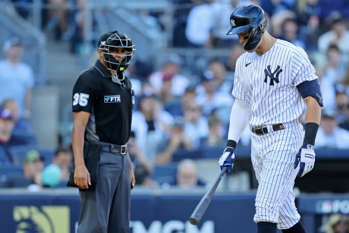 New York Yankees right fielder Aaron Judge (99) complains about a called strike three against the Cleveland Guardians with home plate umpire Jeremie Rehak (35) during the fifth inning in game two ... Brad Penner-USA TODAY Sports